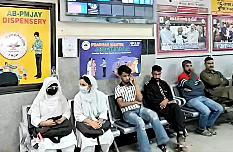 How have over 27,500 patients benefited from free treatment in Rajouri under Ayushman Bharat?