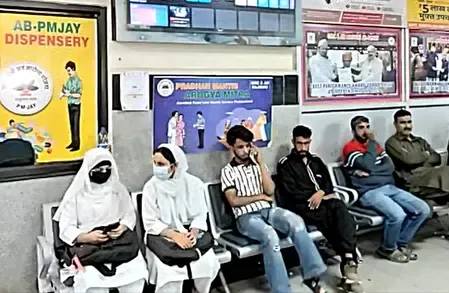 How have over 27,500 patients benefited from free treatment in Rajouri under Ayushman Bharat?