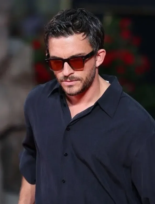 What Does Jonathan Bailey Say About His Quirky Habit During Intimate Scenes?