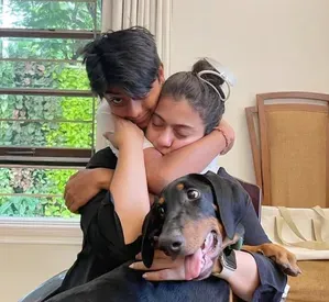 Kajol marks 2nd birthday of her furry friend with a heartwarming
 picture with her son and the puppy