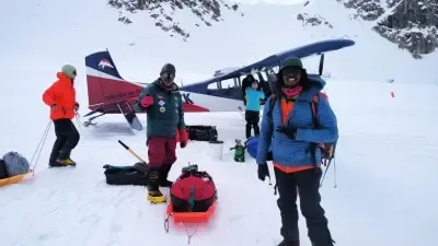 How was Kerala mountaineer Sheikh Hassan Khan 'rescued' from Mount Denali after a blizzard ordeal?