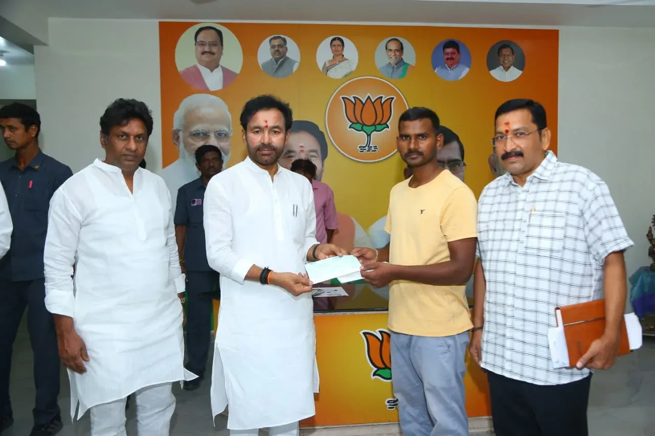 Kishan Reddy Hands Medical Relief Cheque to Suryapet Family