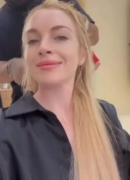 Lindsay Lohan's hair turns pink after sea swim in viral Instagram video