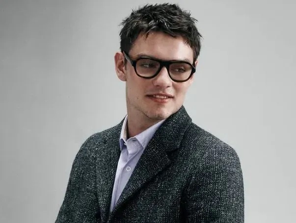 Louis Partridge on fame, social media noise, and the James Bond buzz