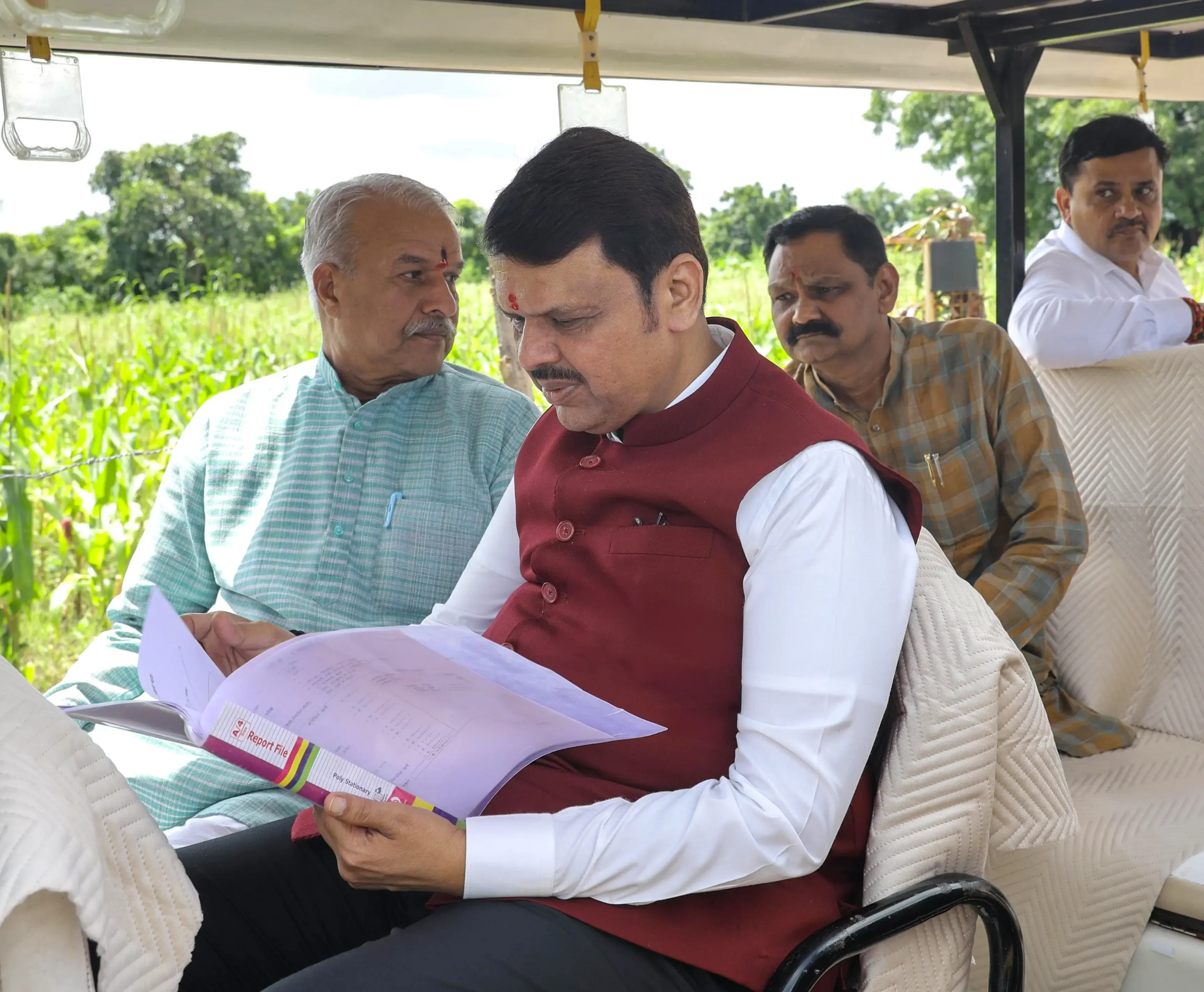 How is the Maha government promoting self-redevelopment of cooperative housing societies?