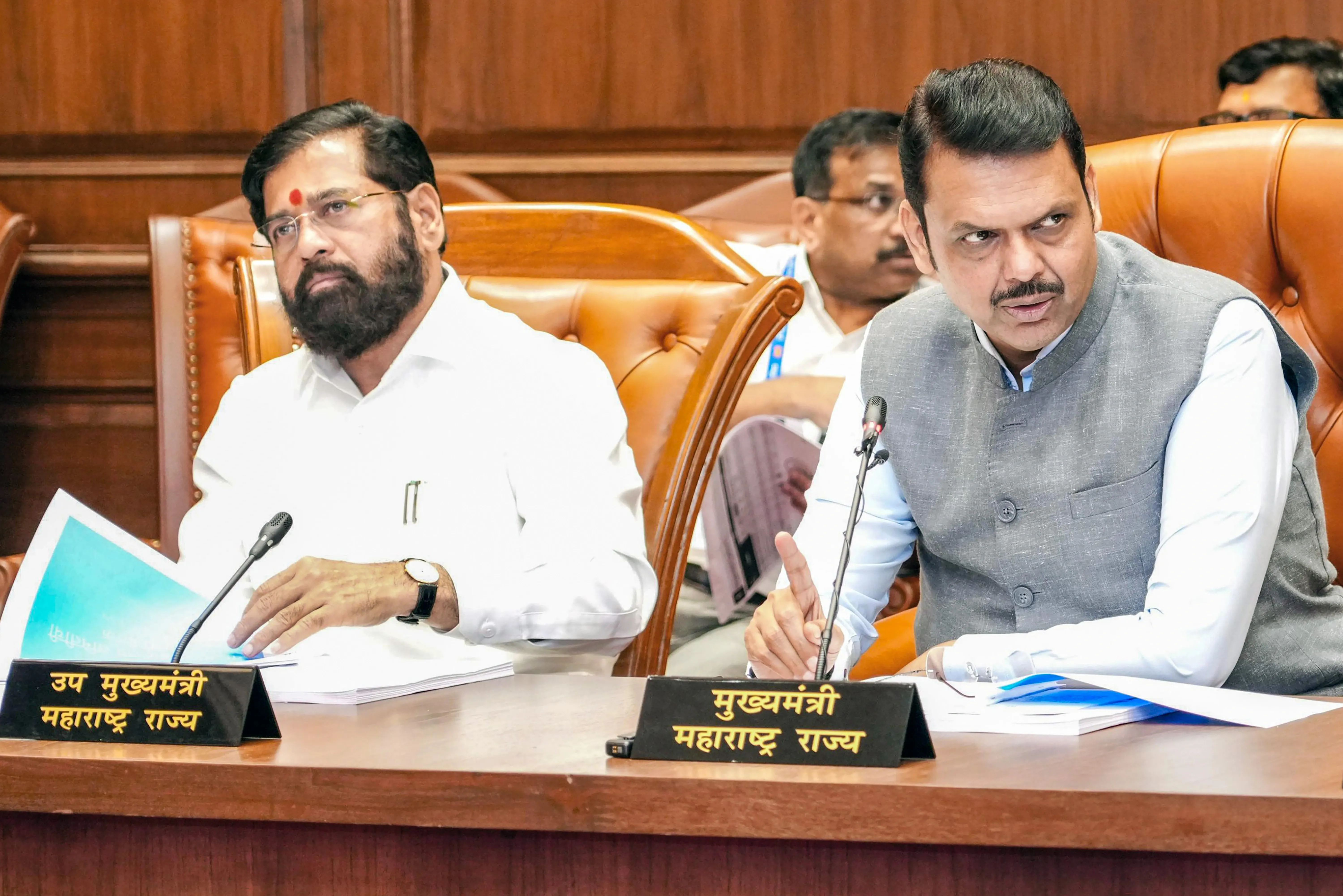 Why are Maha ministers under scrutiny yet not resigning?