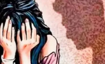 Who has been booked for outraging a woman's modesty in Karnataka?