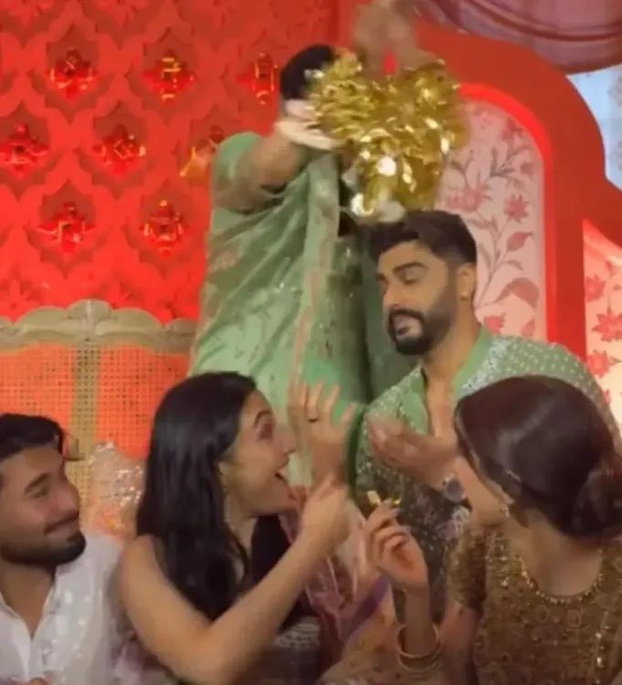 Arjun Kapoor overjoyed as kaleera lands on him at Anshula's pre-wedding