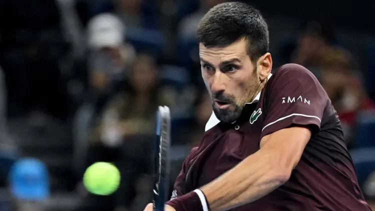 China Open: Djokovic reaches Beijing final after Medvedev defaulted