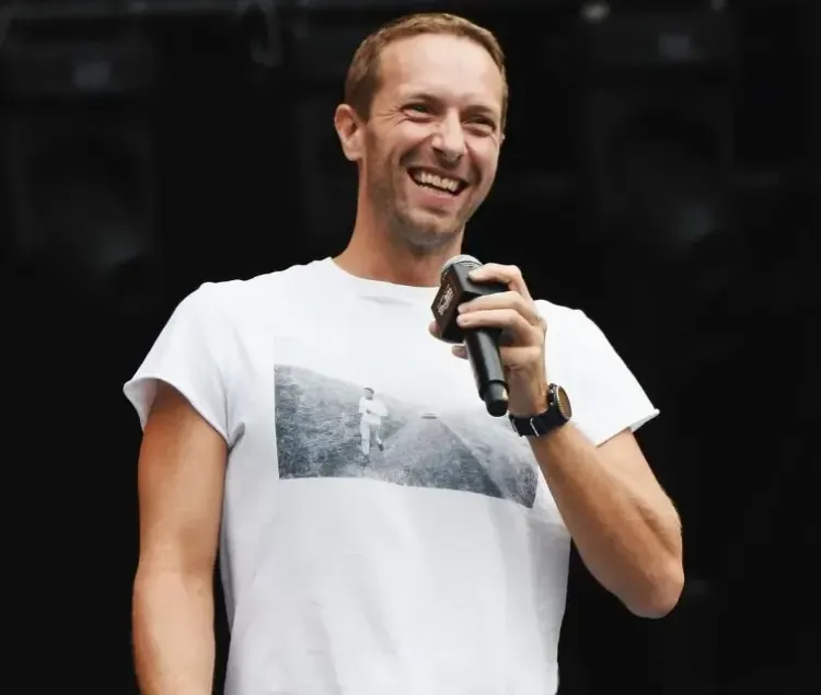 Did Chris Martin Leave Newlyweds Speechless with a Surprise Performance?