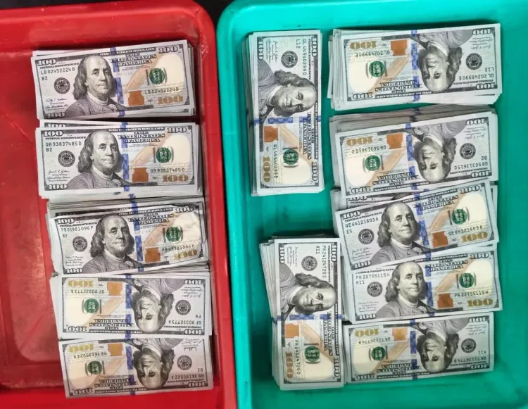 CISF seizes USD 1.19 lakh in fake-bottom bags at Kolkata airport