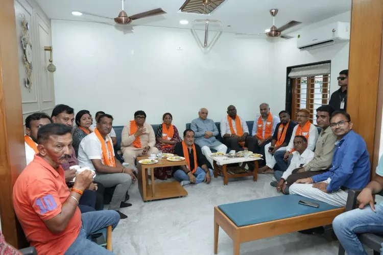 CM Bhupendra Patel watches Mann Ki Baat with Ghatlodia workers