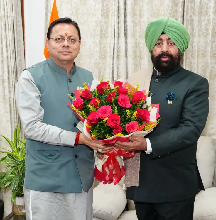 CM Dhami Calls on Governor Gurmeet Singh at Lok Bhawan