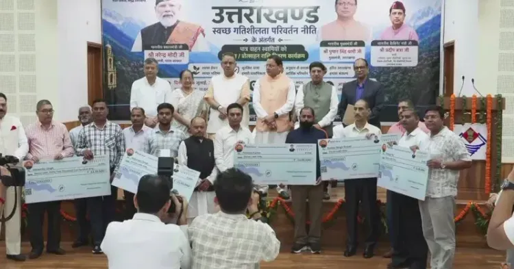 CM Dhami Distributes Vehicle Owner Grants in Dehradun