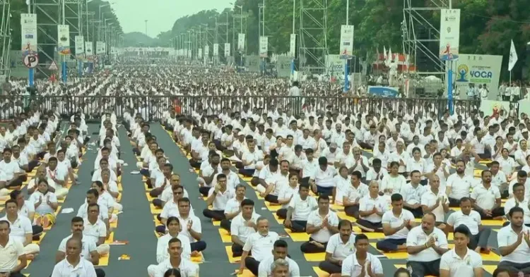 CM Dhami Shares Live Update of PM Modi at 12th International Yoga Day