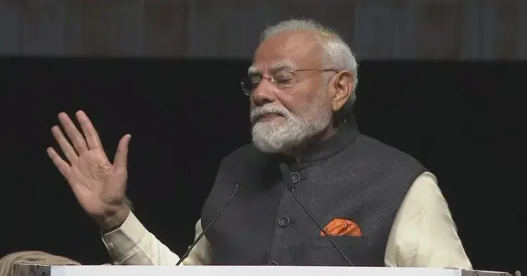CM Dhami shares PM Modi's live community event in Auckland