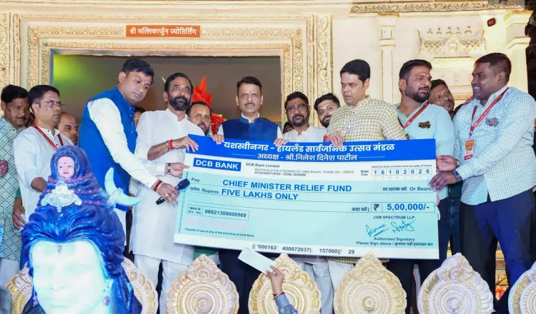 CM Fadnavis gets ₹5 lakh cheque for drought-hit farmers