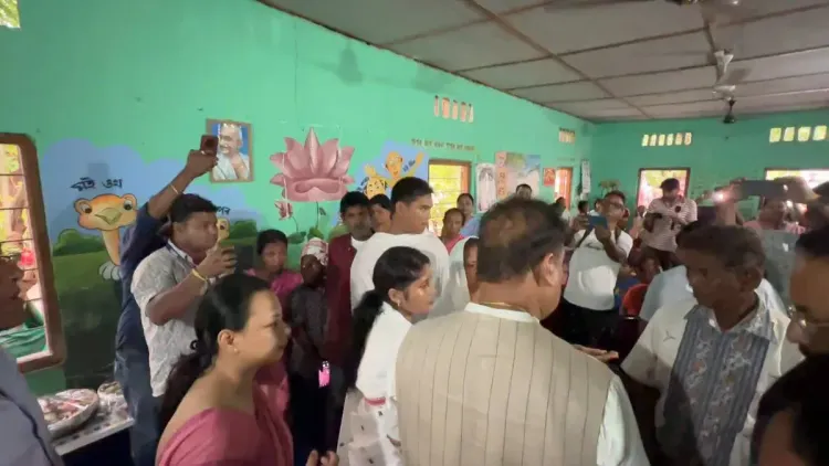 CM Himanta visits Sonari flood relief camp, hands out school uniforms