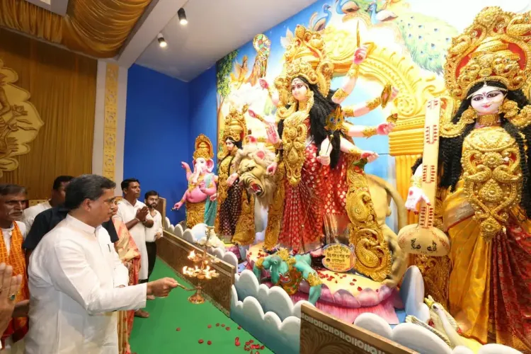 CM Manik Saha Opens Durga Puja Pandal, Distributes Clothes in Agartala