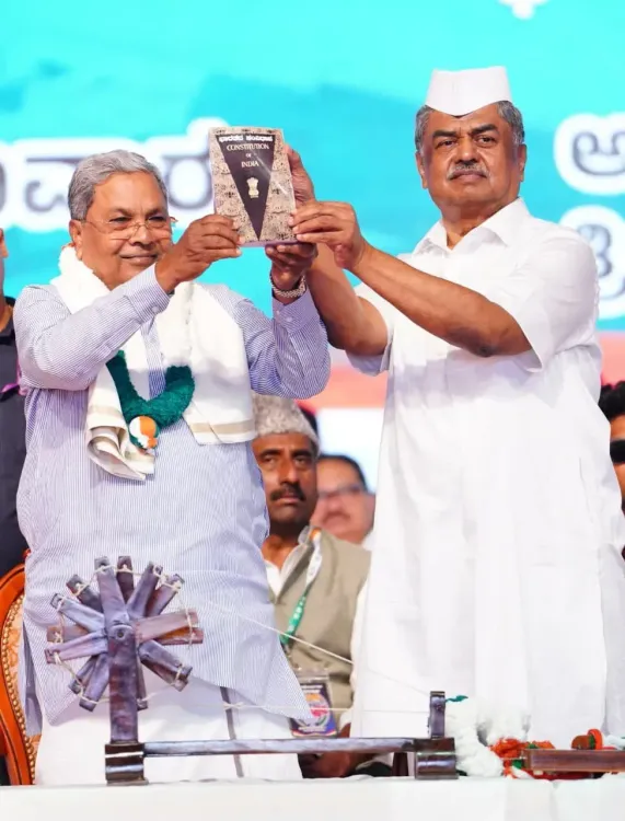 CM Siddaramaiah gifts Constitution to new KPCC chief Hariprasad