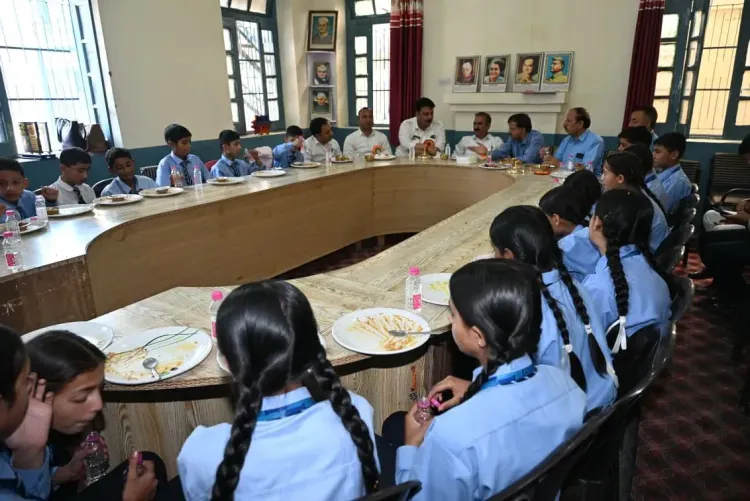 CM Sukhu Meets Children in Nerwa, Shares Midday Meal