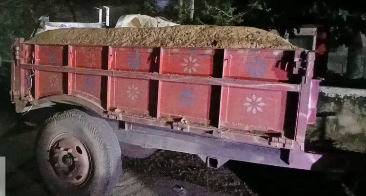 Is there a crackdown on the sand mafia with 9 tractors seized during a raid in Patna?
