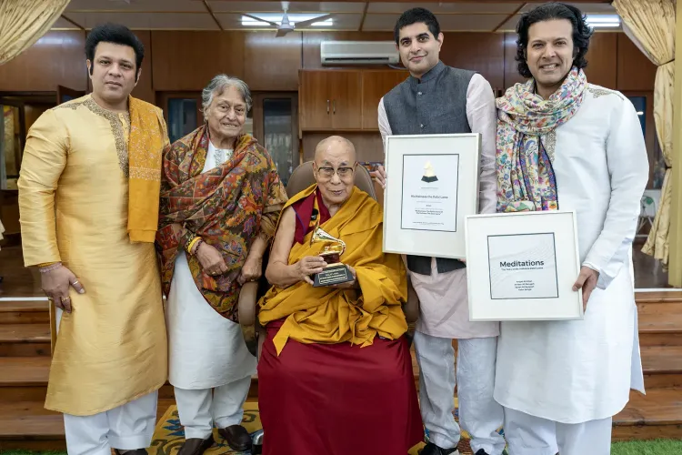Dalai Lama receives Grammy from Amjad Ali Khan at Dharamshala home
