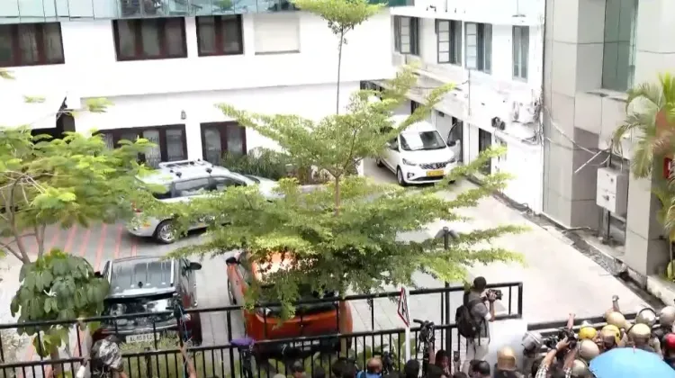 ED raids 10 locations in CMRL fraud probe, seizes FDs linked to Veena Vijayan
