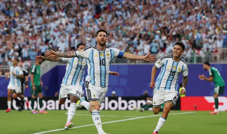 Messi hat-trick equals Klose's 16-goal record as Argentina beat Algeria 3-0