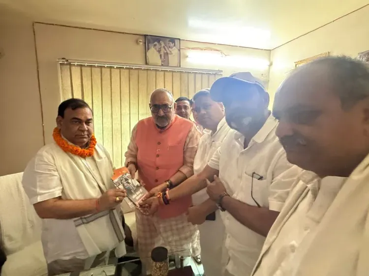 Giriraj Singh Shares BJP's 12-Year Governance Booklet in Begusarai