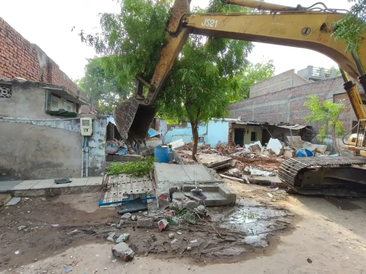 Gujarat HC order: 7 of 37 Ahmedabad families vacate Shivnagar homes after rehab deal