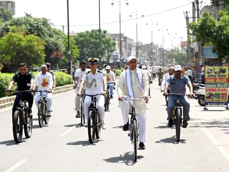 Gujarat Governor cycles to Kurukshetra Gurukul after train ride, champions fuel conservation