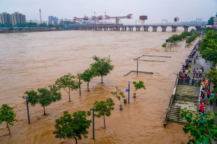 What Measures Are Being Taken in Ahmedabad Due to Heavy Water Discharge from Dharoi Dam?