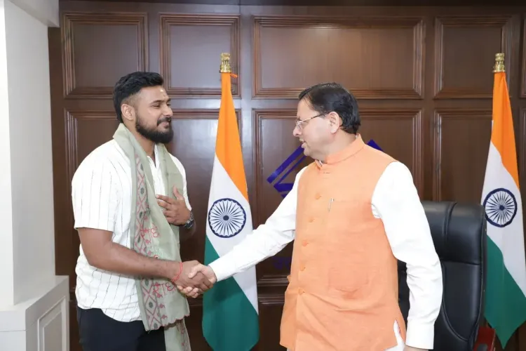 Uttarakhand CM Dhami felicitates Indian basketball star Ulhas K.S