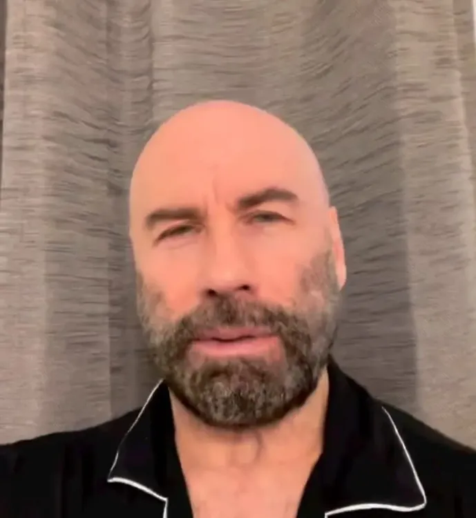John Travolta on why he owns 12 berets after Cannes style triumph