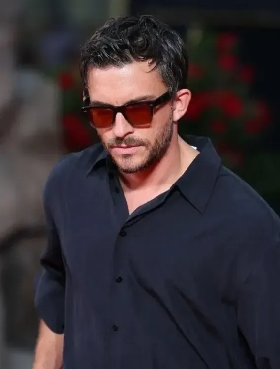 What Does Jonathan Bailey Say About His Quirky Habit During Intimate Scenes?