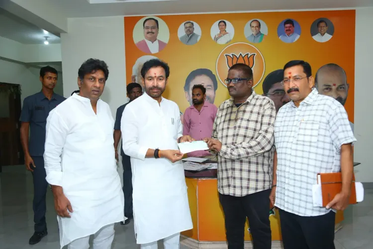 Kishan Reddy Hands Over Medical Aid Cheque in Hyderabad