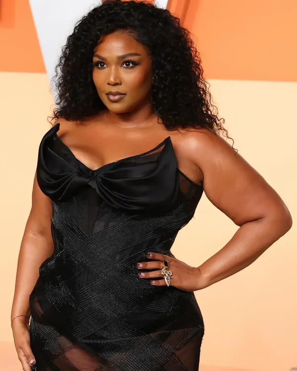 Lizzo on childhood insecurity, flute struggles, and immunity to hate