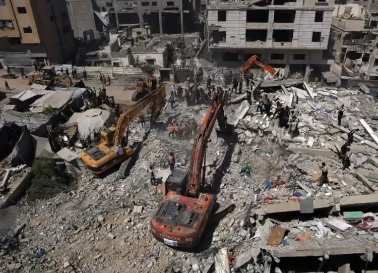 Gaza building collapse kills 21, including 11 children, in western Gaza City