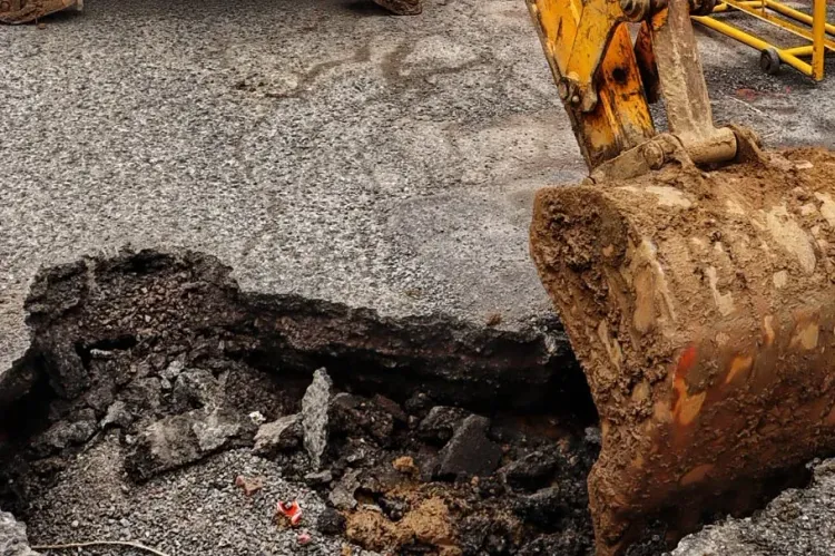 Noida Sector 73 road caves in near D-Mart site after heavy rain, probe ordered