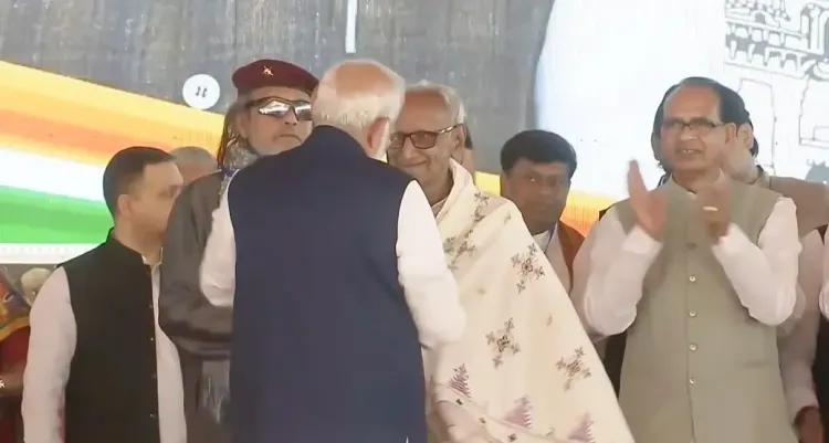 PM Modi seeks blessings of 98-year-old BJP veteran Makhanlal Sarkar at West Bengal swearing-in