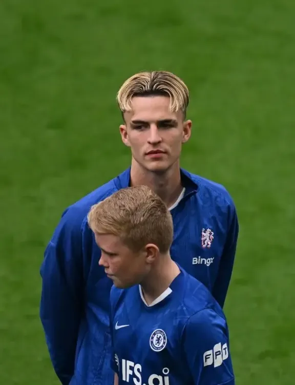 Chelsea's Derry reassures fans after scary head injury in Premier League debut