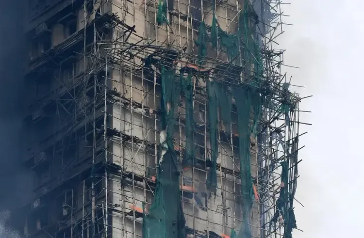 What Actions Are Being Taken After the Fire Incident in Hong Kong?