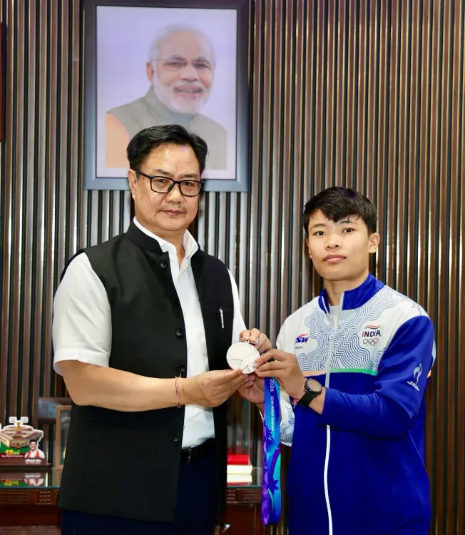 Rijiju meets Roshibina Devi, India's first 3-time Asian Games Wushu medallist