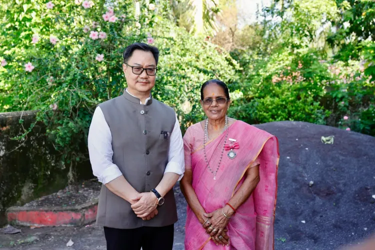 Rijiju presents Modi govt booklet, plants tree in Andaman