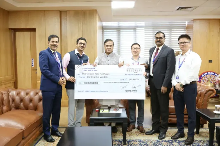 SBI Contributes ₹1.60 Crore to Assam CM Relief Fund