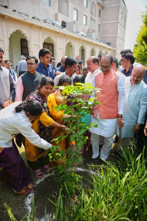 Shivraj plants saplings with women farmers at Sanchi