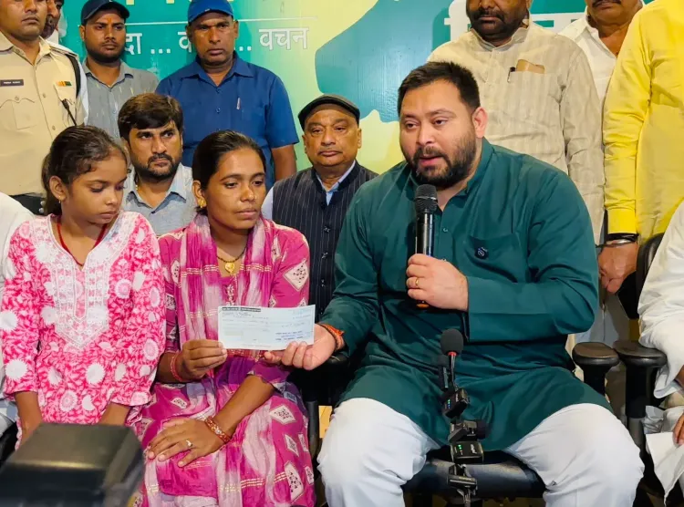 Tejashwi Yadav hands Rs 5 lakh cheque to Bunty Yadav's family