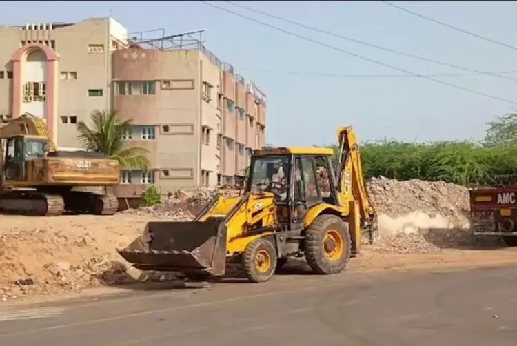 AMC demolishes 37 unauthorised houses in Ahmedabad's Motera Koteshwar village