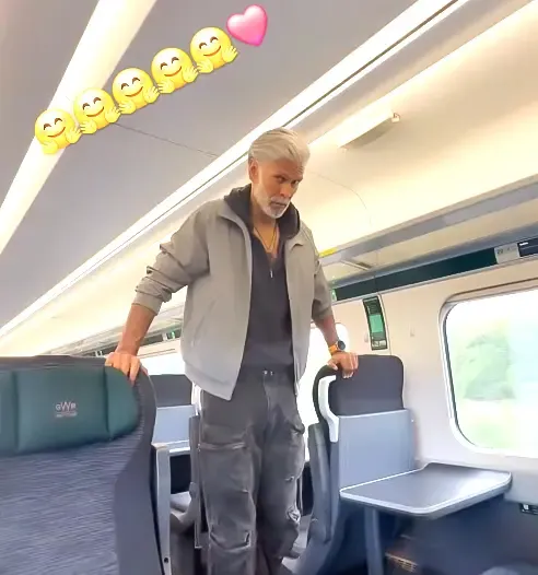 Did Milind Soman Just Do Push-Ups on a Train?